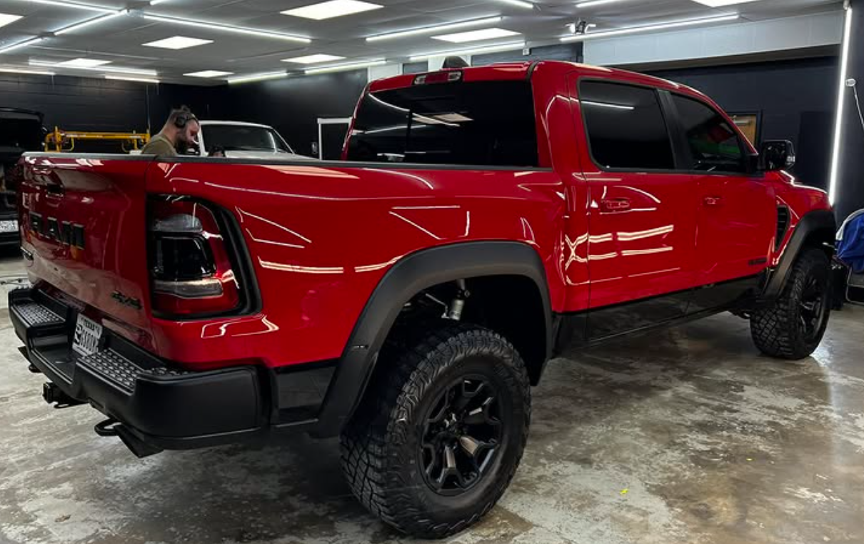 Red RAM truck with glossy protected finish at Paint Slayer Auto Spa in Amarillo