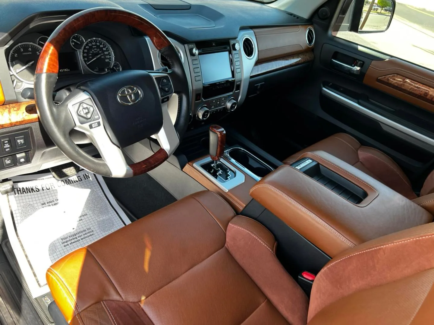 Vehicle receiving full interior and exterior detail at PaintSlayer AutoSpa