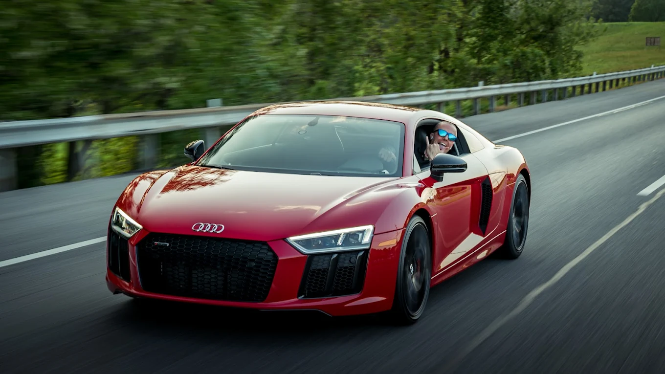 Red Audi R8 on the highway after paint correction